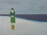 Figure of a woman in green by the seashore